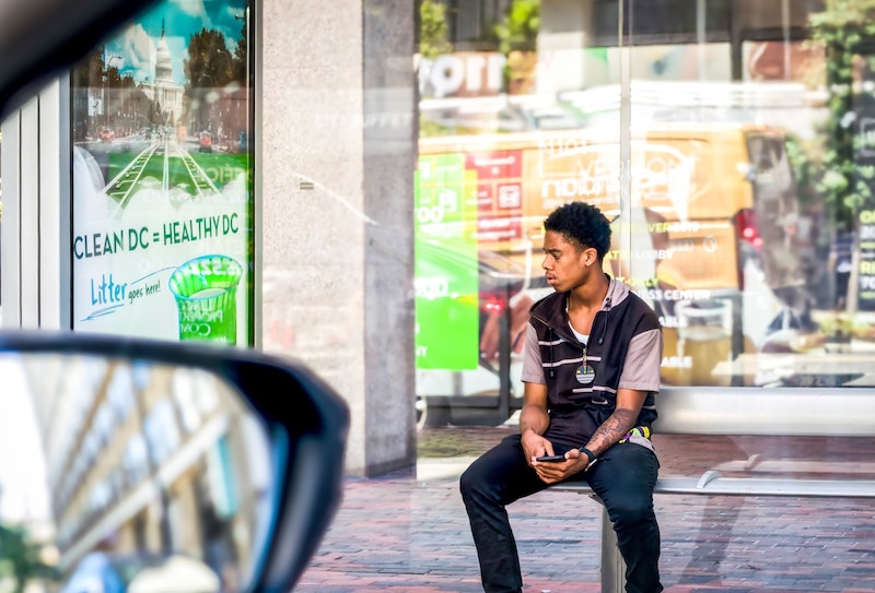 Driving instructor waiting on pupil. Photo by Obi Onyeador